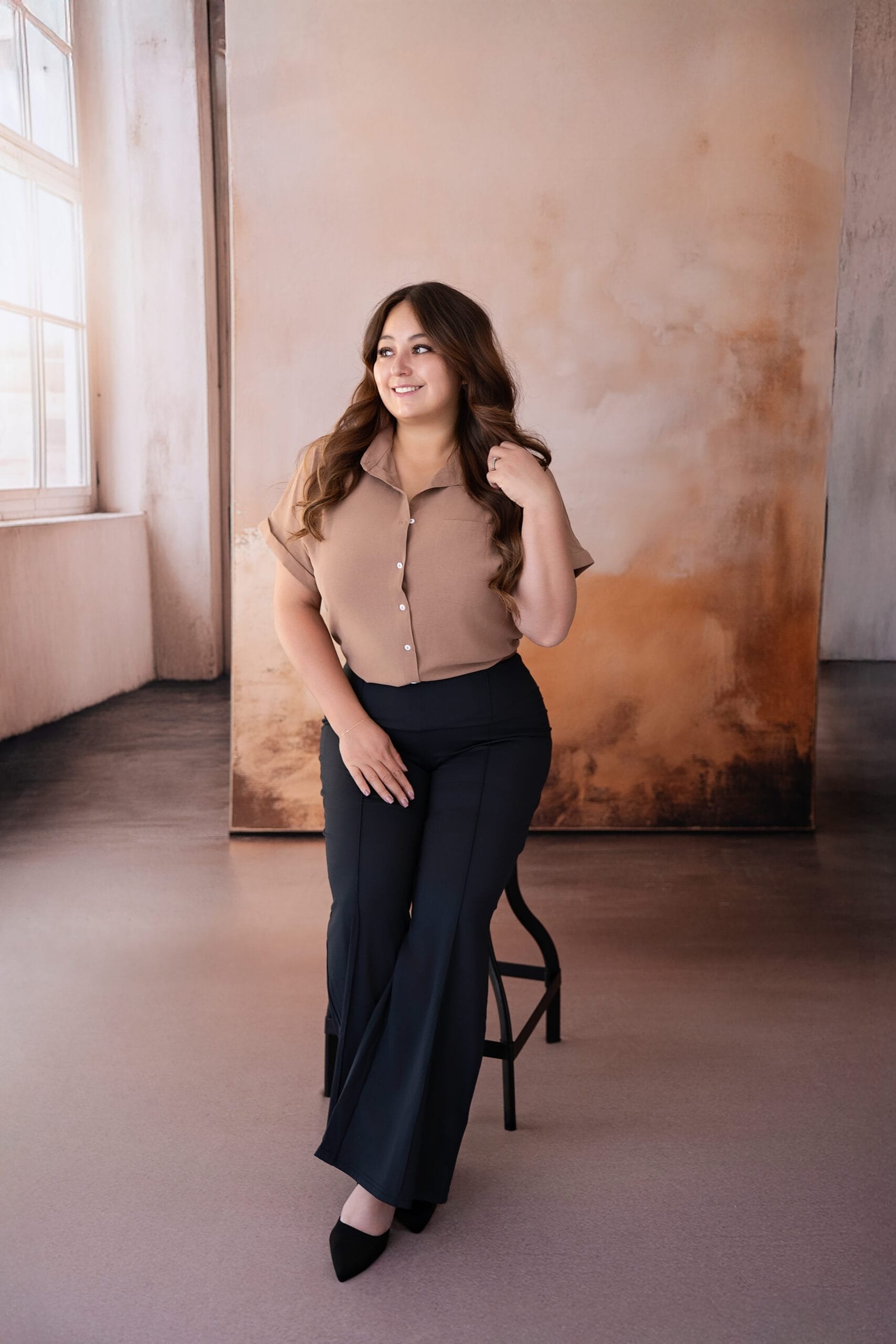 Evoto Studio Maternity photoshoot of gorgeous pregant woman in black dress